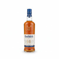 A bottle of Glen Fiddich single malt whisky with a small matching glass, shown on a plain light gray background.