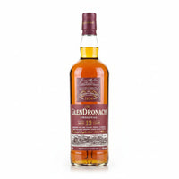 A bottle of Glen Ronach 12 Year Old Single Malt Scotch Whisky, shown diagonally on a light gray background. The bottle is filled with amber-colored whisky and features a prominent maroon label with gold and white text.